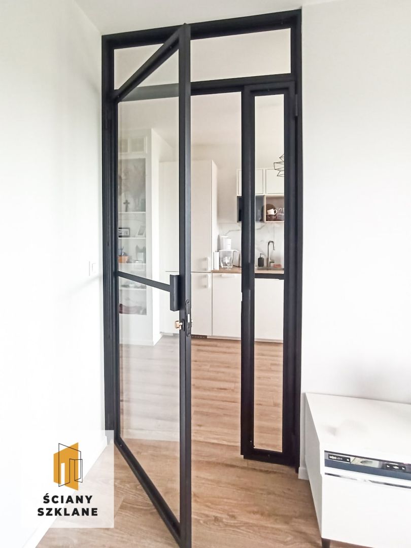 szklane drzwi skrzydłowe z zamkiem oraz naświetlem